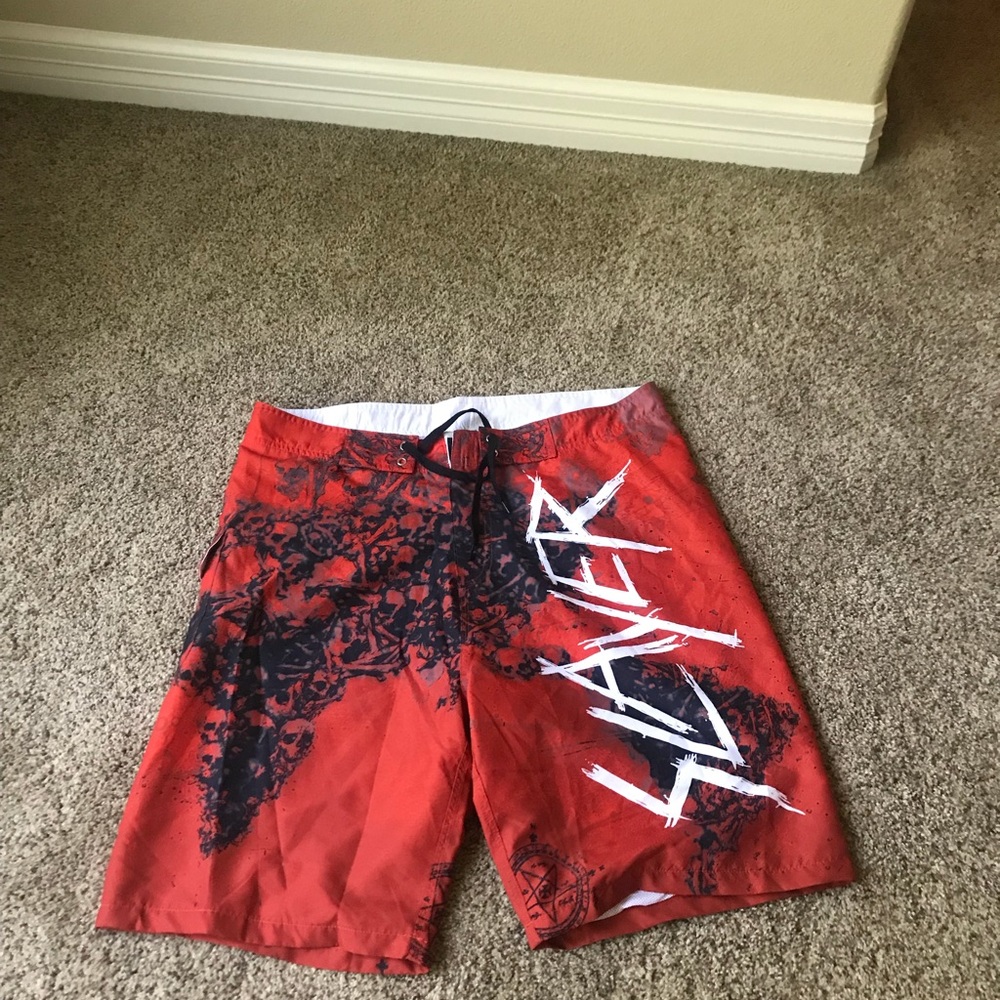 Men’s Slayer swim trunks.
